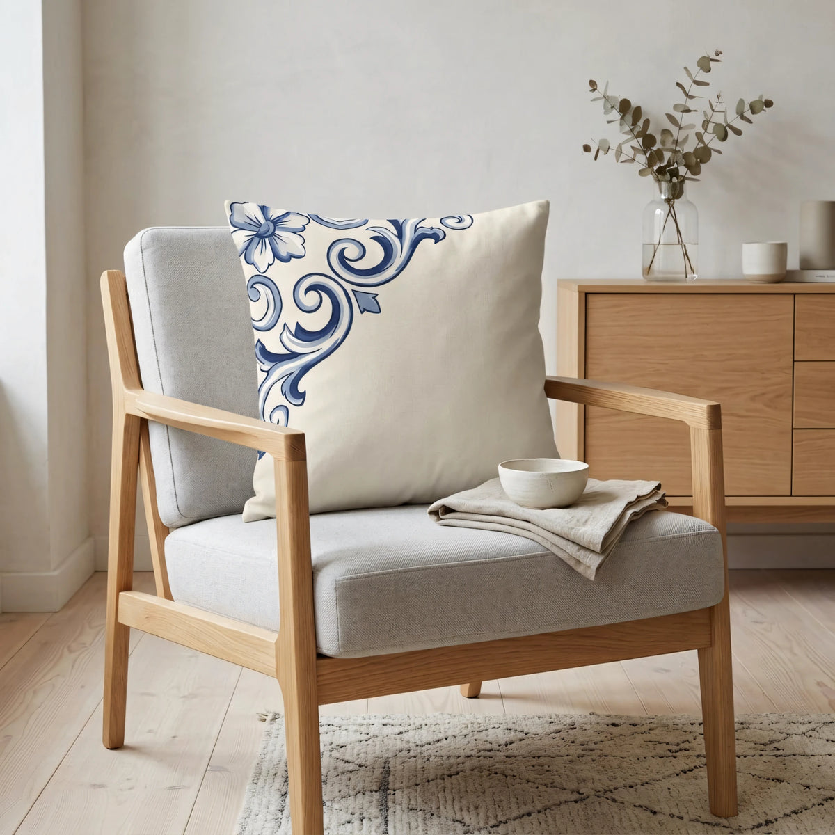 Cobalt Ceramic Scroll Cushion Cover, lifestyle view.